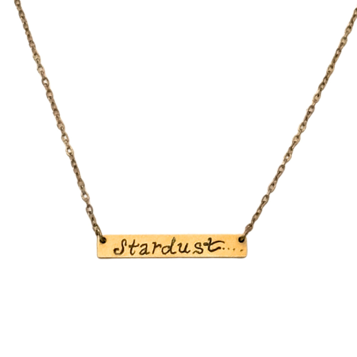 Gold necklace with 'Stardust' pendant on a white background